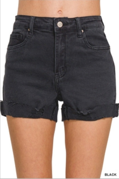 Distressed denim shorts rolled