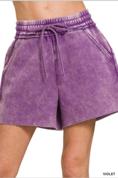 Acid washed raw hem shorts