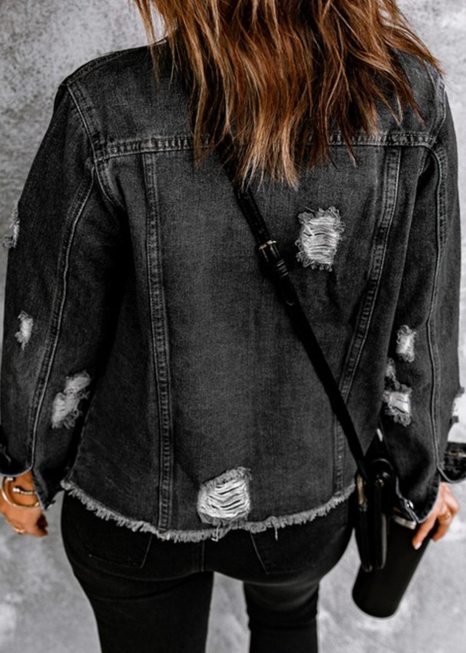 Distressed denim jacket