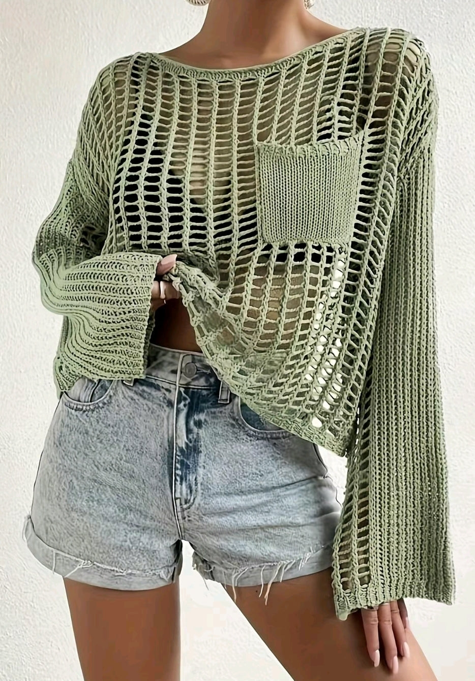 Open knit sweater with pocket