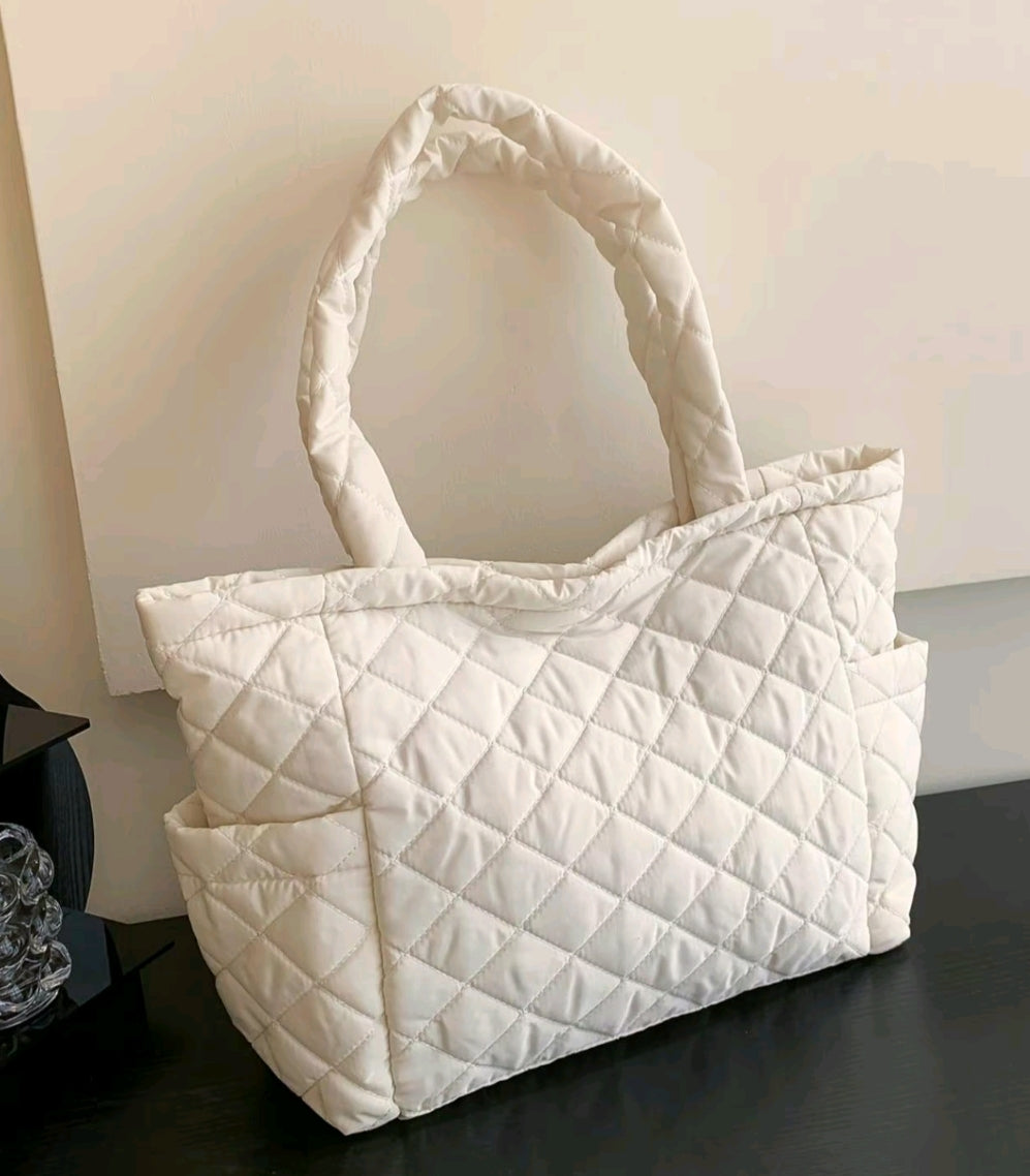 Large puffer shoulder bag with side pockets