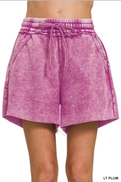 Acid washed raw hem shorts