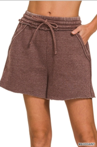 Acid washed raw hem shorts