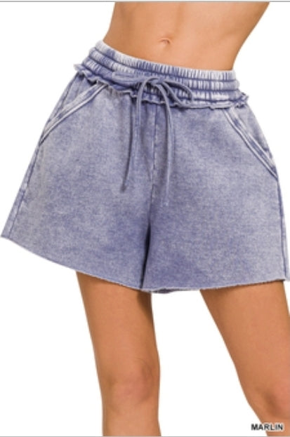 Acid washed raw hem shorts
