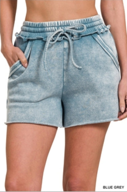 Acid washed raw hem shorts